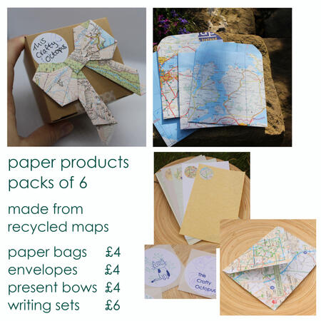 paper products - packs of 6 - made from recycled maps - paper bags, envelopes and present bows all £4 - writing sets £6